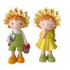 Deko Figuren Kind  2er Assortierung  stehend mit  Sonnenblumenhut  Grösse 7.5x11x19cm