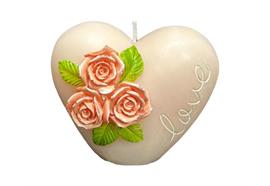 Kerze in Herzform  mit kleinen Rosen  verziert in Rosa